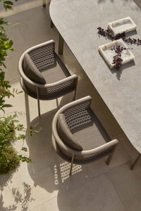 Gandia Blasco Arco Dining Armchairs in Bronze, overhead outdoor view