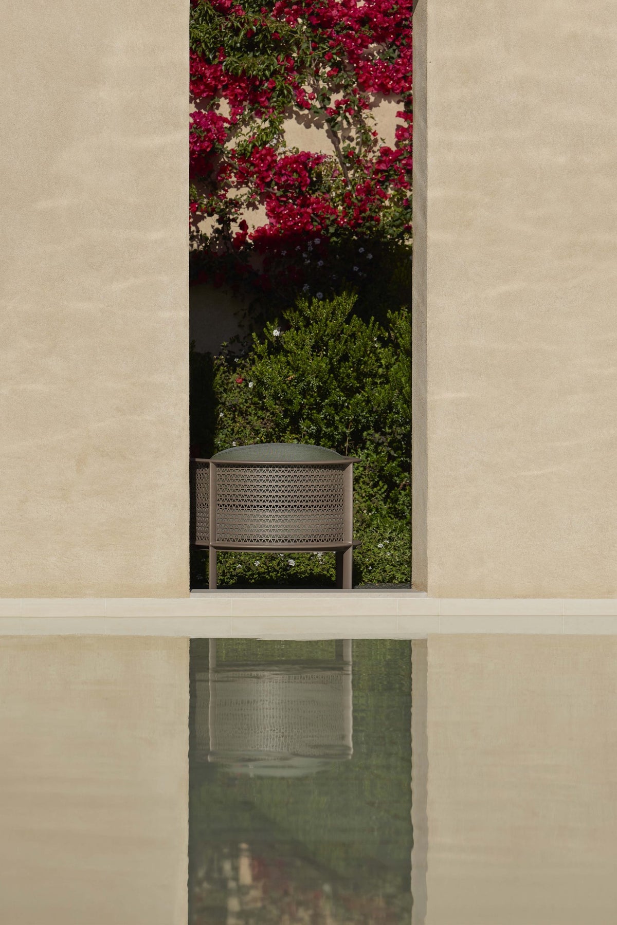 Gandia Blasco Arco Lounge Chair in Bronze with perforated aluminium backrest