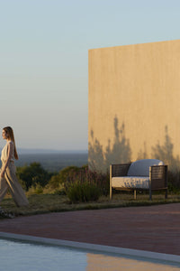 Gandia Blasco Arco Lounge Chair in Bronze at sunset