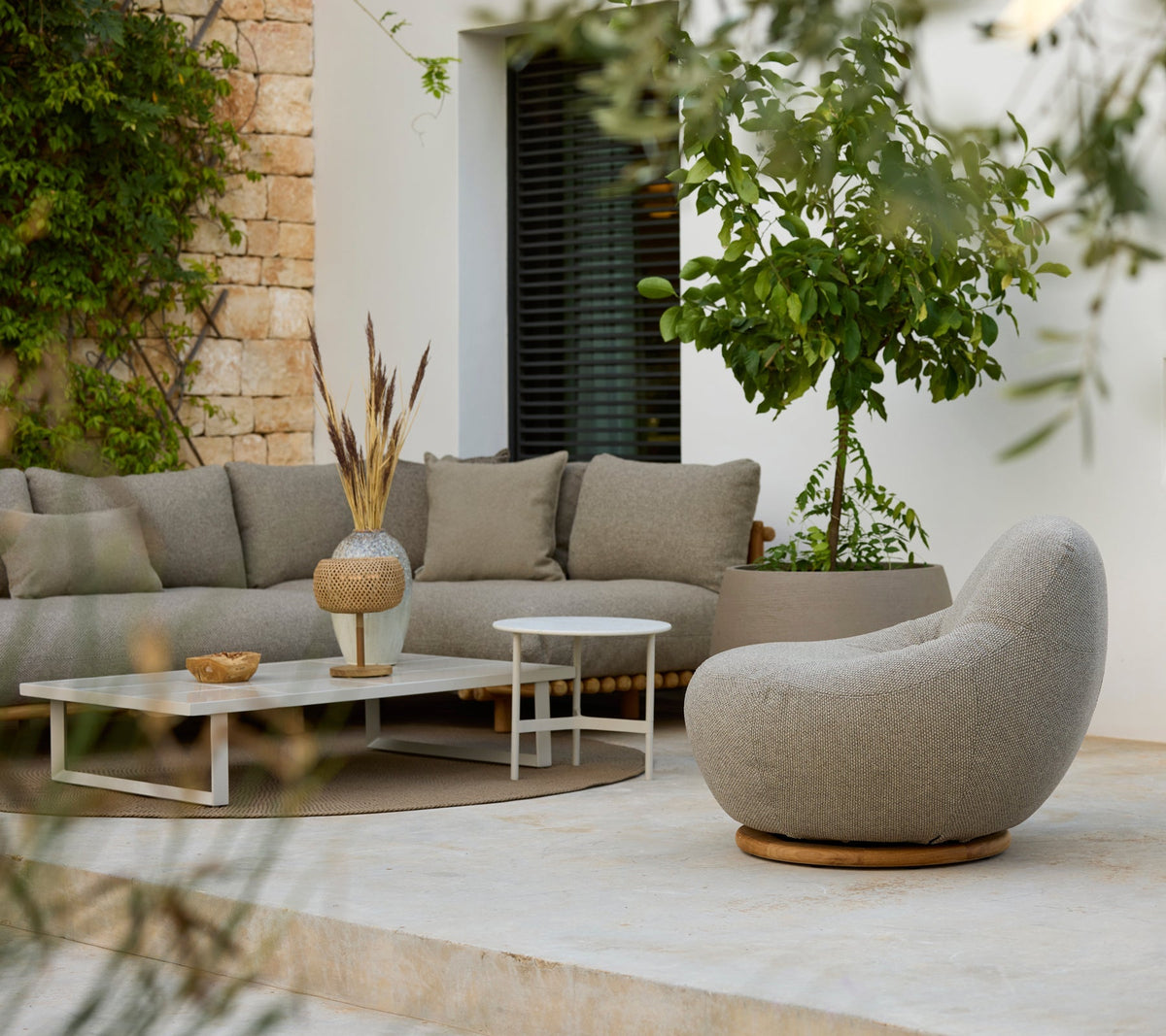 Glaze coffee table rectangular lifestyle image by Cane-line