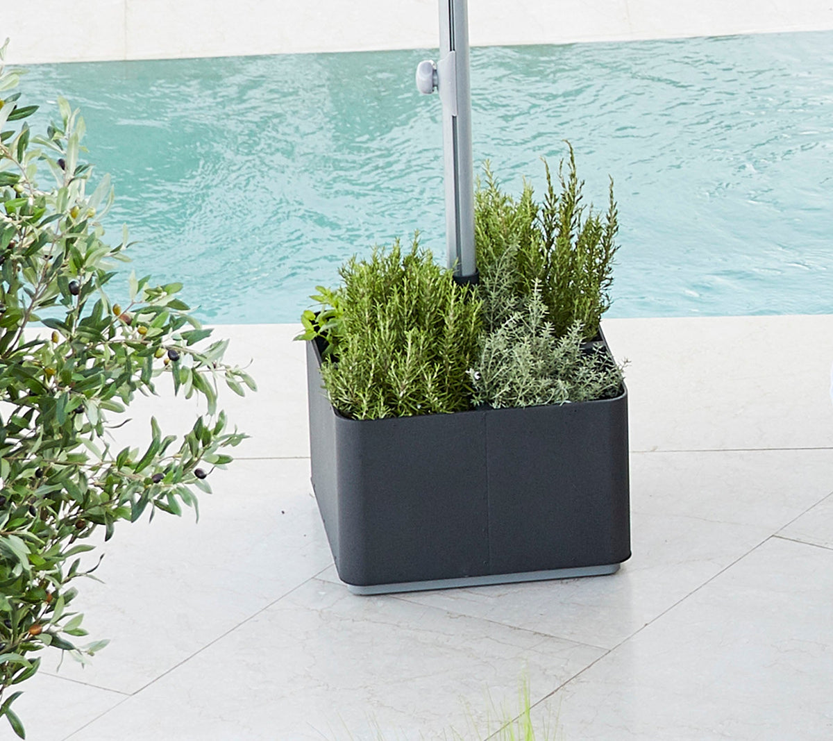 Grow parasol base with wheels by Cane-line, designed by Cane-line Design