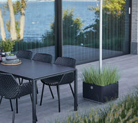 Grow parasol base with wheels by Cane-line, designed by Cane-line Design