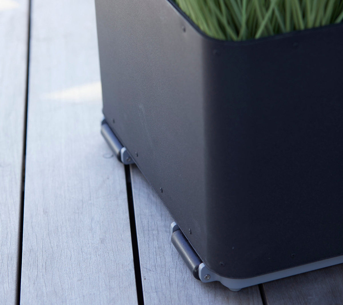 Grow parasol base with wheels by Cane-line, designed by Cane-line Design