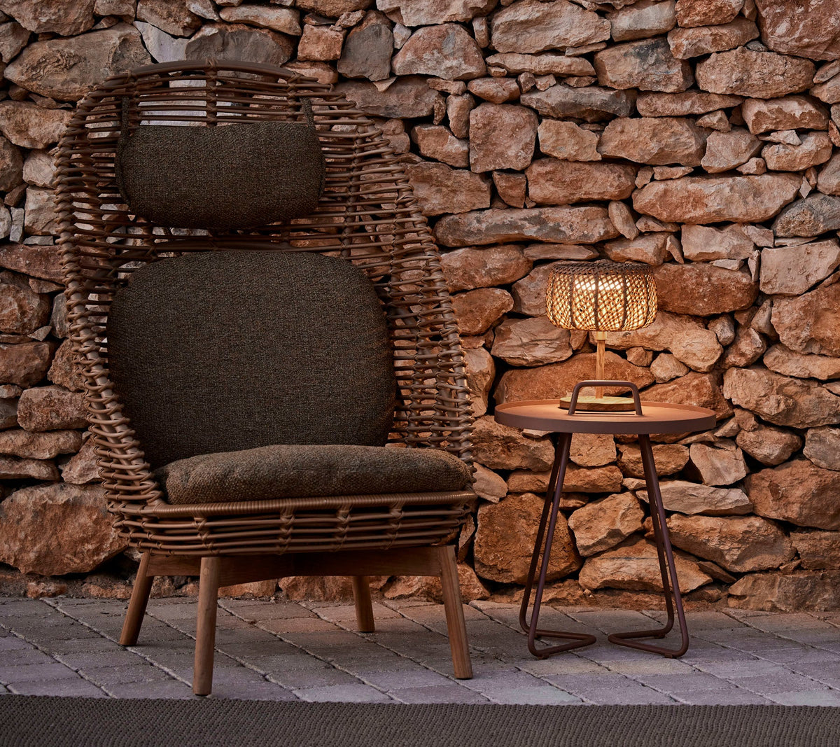 Hive highback chair outdoor lifestyle image by Cane-line