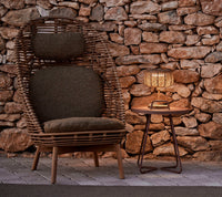 Hive highback chair outdoor lifestyle image by Cane-line