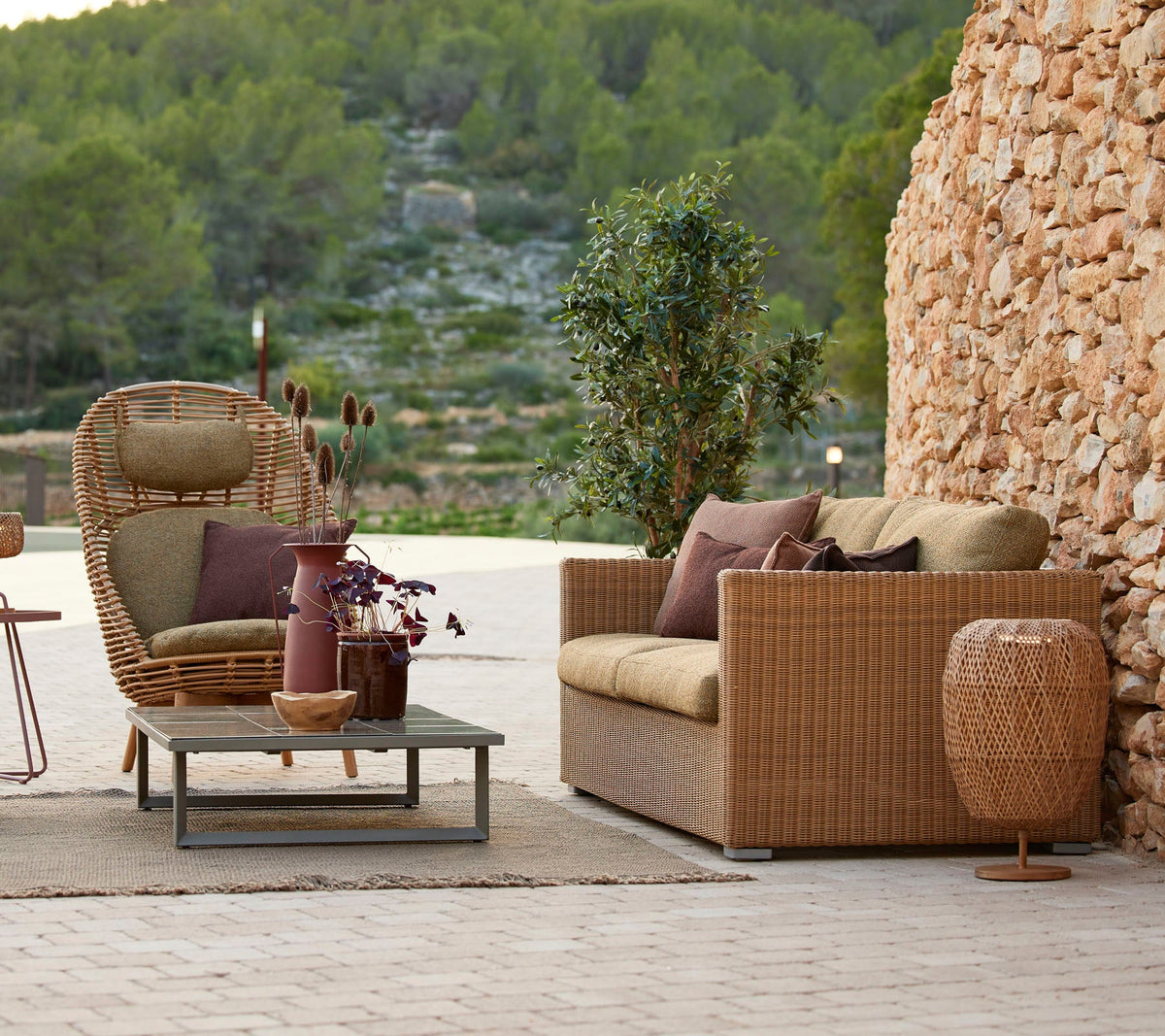 Hive highback chair outdoor lounge chair by Cane-line, designed by Foersom and Hiort-Lorenzen MDD