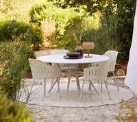 Joy dining table dia. 120 cm outdoor dining table by Cane-line, designed by Cane-line Design