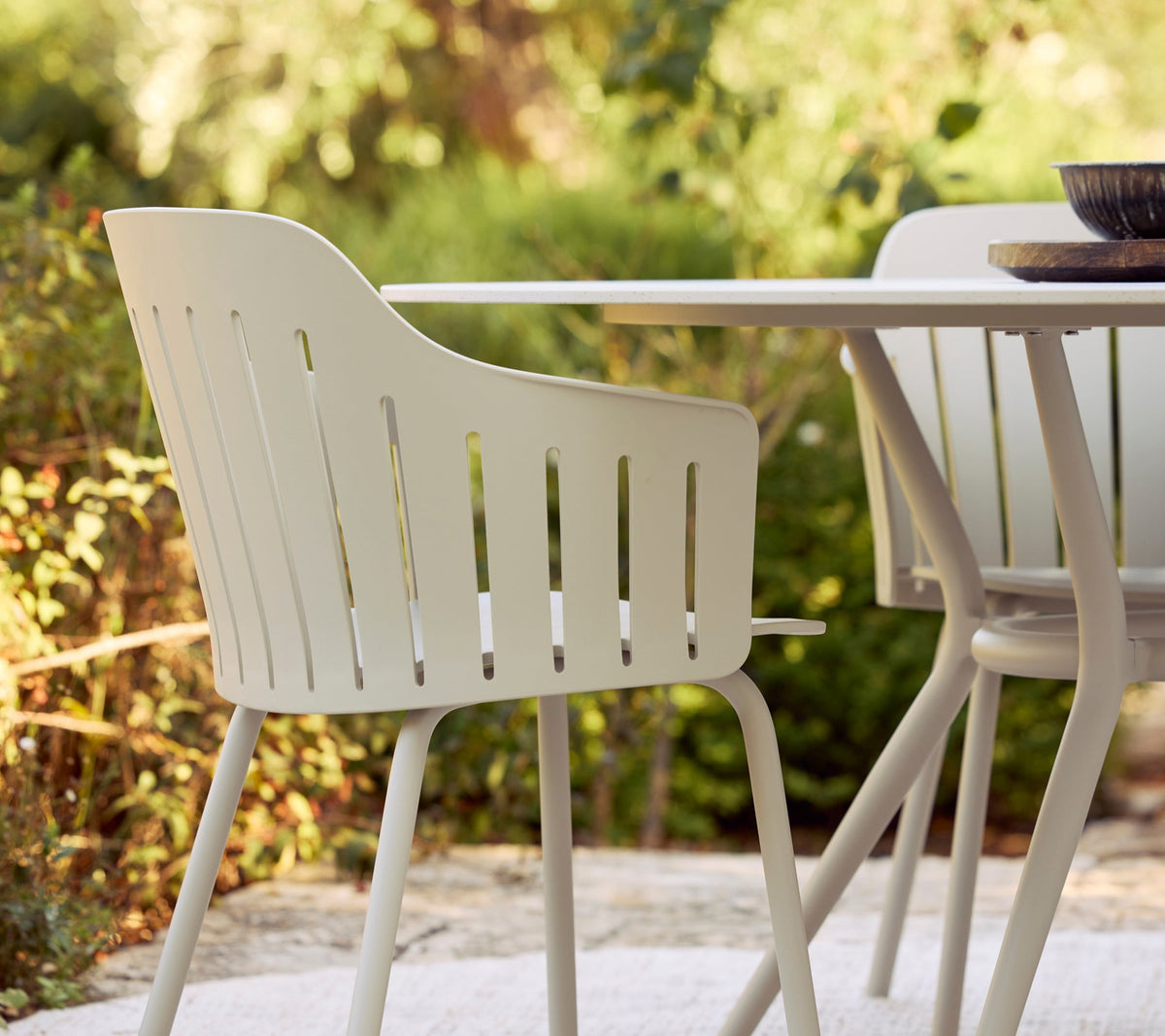 Joy dining table dia. 120 cm outdoor dining table by Cane-line, designed by Cane-line Design