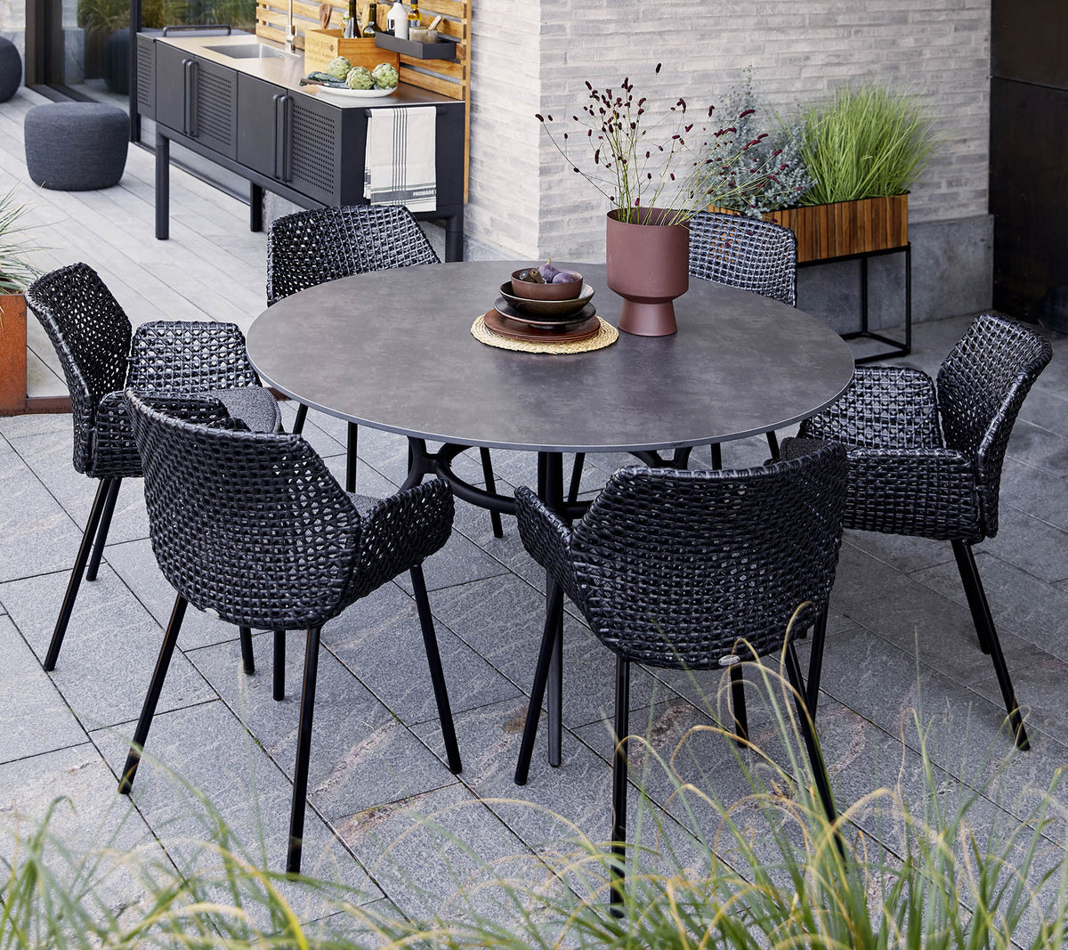 Joy dining table dia. 144 cm outdoor dining table by Cane-line, designed by Cane-line Design