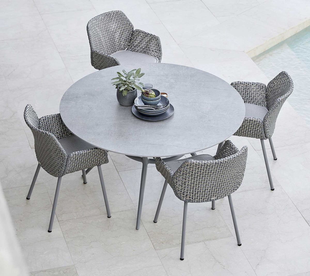 Joy dining table dia. 144 cm outdoor dining table by Cane-line, designed by Cane-line Design