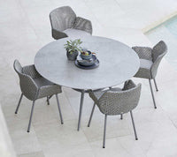Joy dining table dia. 144 cm outdoor dining table by Cane-line, designed by Cane-line Design