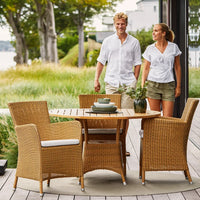 Lansing sofa with outdoor dining table lifestyle image