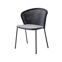 Lean chair outdoor dining table lifestyle image by Cane-line