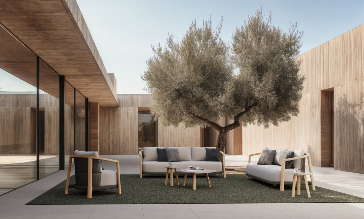 Lenis outdoor sofa and lounge chairs by SKLD Studio in a modern outdoor setting
