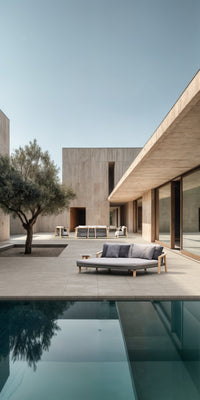 Lenis outdoor daybed by SKLD Studio beside a modern pool
