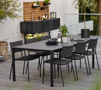 Less armchair outdoor dining lifestyle image by Cane-line