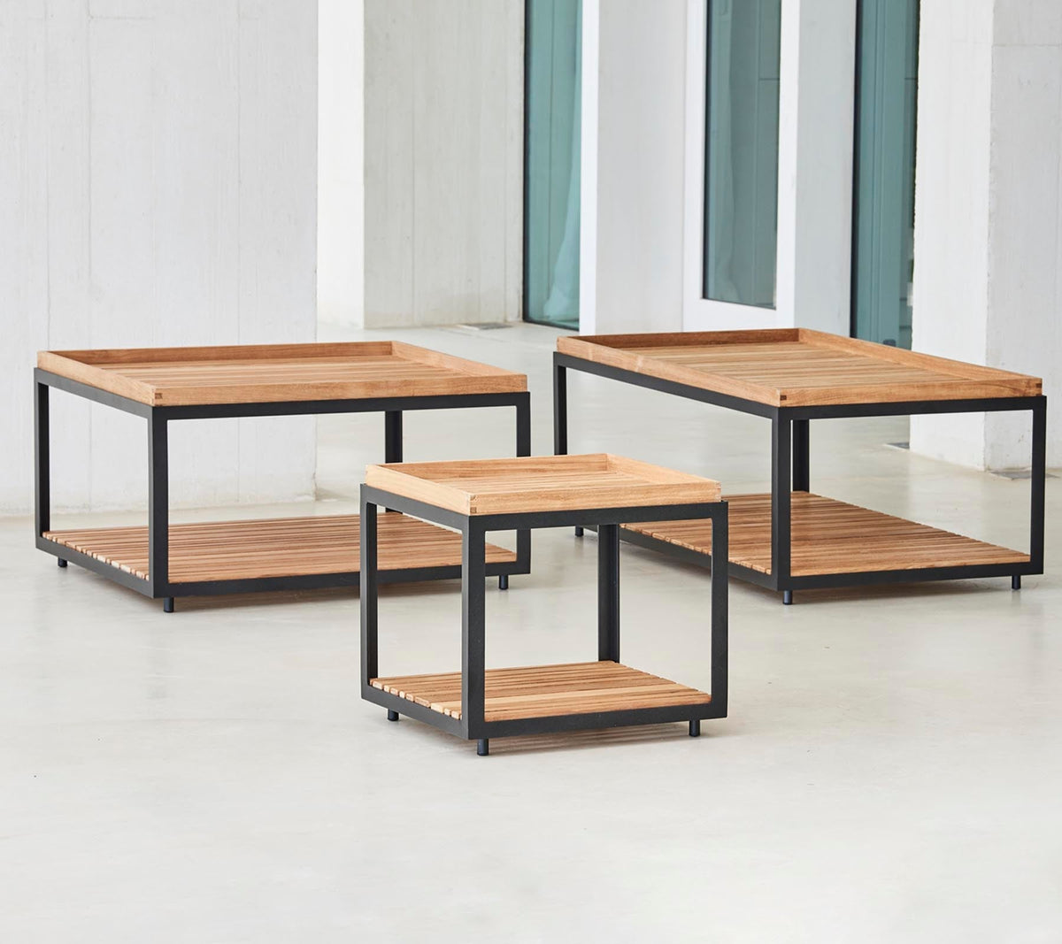 Level coffee table collection teak lifestyle image by Cane-line