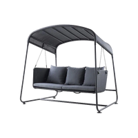Cave Swing Sofa outdoor swing sofa by Cane-line, designed by Jesper K. Thomsen
