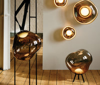Melt Large Portable Light Bronze Polished Polycarbonate floor light by Tom Dixon in a contemporary interior