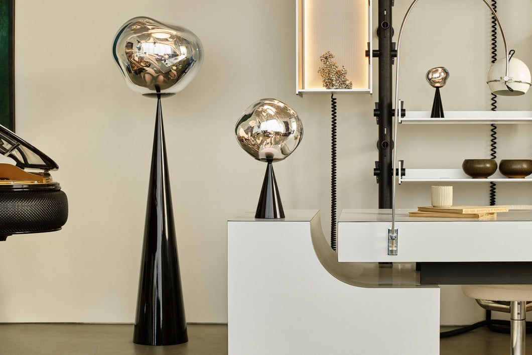 Melt Fat Cone Floor Light Nickel Polished Polycarbonate floor light by Tom Dixon in a modern living room