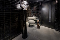 Melt Fat Cone Floor Light Nickel Polished Polycarbonate floor light by Tom Dixon in a contemporary interior