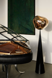 Melt Fat Cone Floor Light Copper Polished Polycarbonate floor light by Tom Dixon in a close up detail