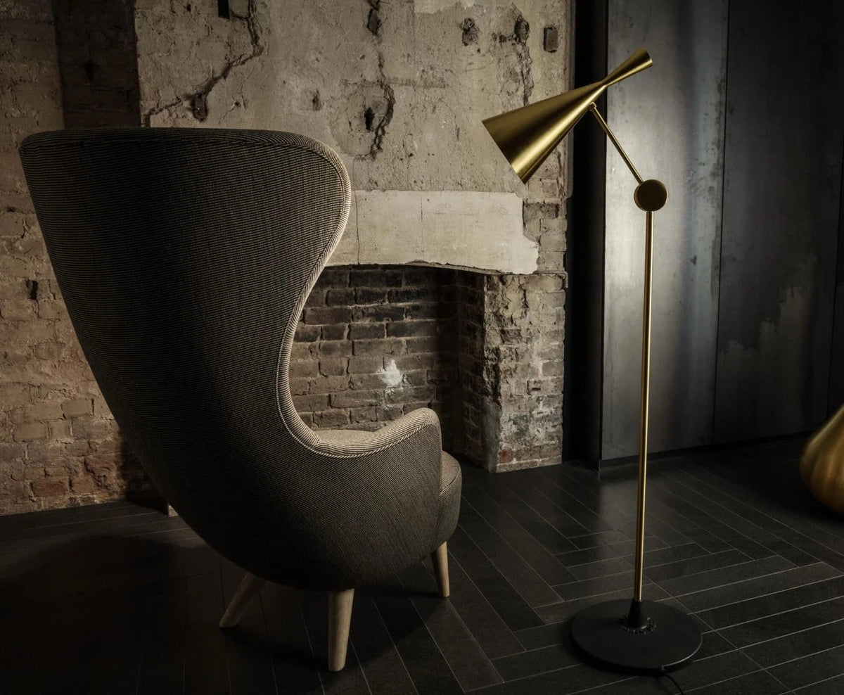 Beat Floor Light Polished Brass floor light by Tom Dixon in a modern room setting