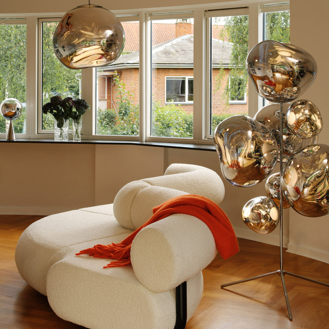 Melt Floor Chandelier Gold Polished Polycarbonate floor light by Tom Dixon in a contemporary interior