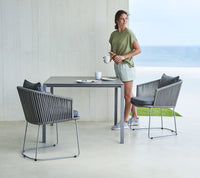 Pure dining table 100x100 cm outdoor dining lifestyle image by Cane-line