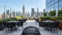 Roberti Altomare outdoor dining furniture on a city rooftop terrace