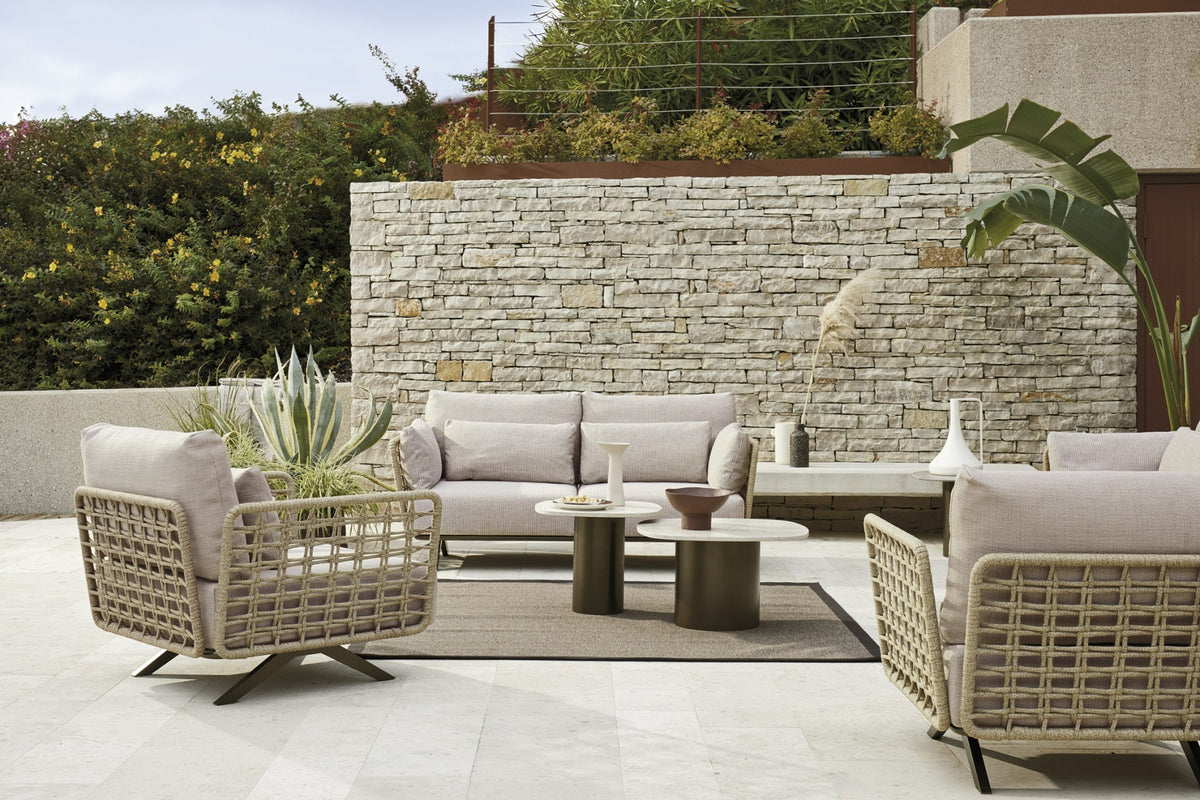 Roberti Armàn lounge chairs and sofa outdoors