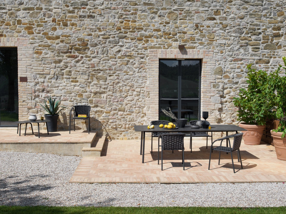Roberti Capri 4301 chairs in Graphite with an outdoor dining table