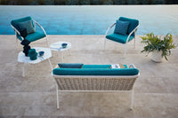 Roberti Capri 4311 lounge chairs and 4312 sofa in White on a terrace