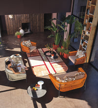 Roberti Corolle round coffee tables with lounge seating