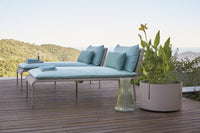 Roberti Key West chaise lounges and planter on a terrace