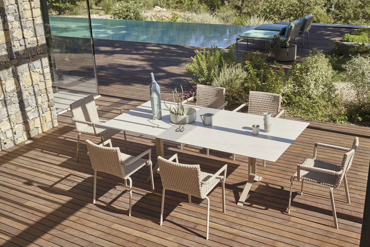 Roberti Key West outdoor dining collection on a wood terrace