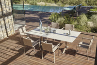 Roberti Key West outdoor dining collection on a wood terrace