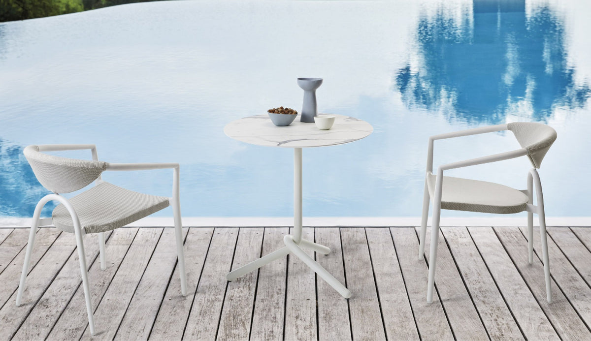 Roberti Maratea armchairs and bistrot table beside a pool
