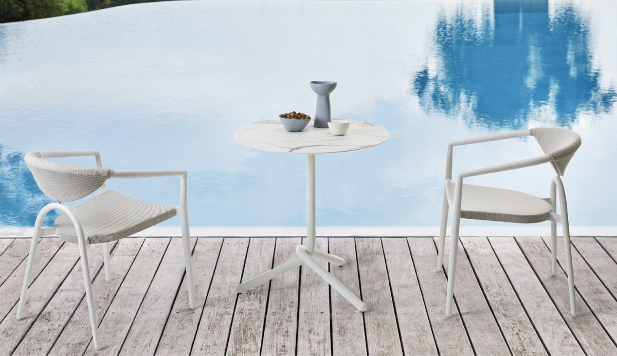 Roberti Maratea bistrot table and armchairs beside a pool