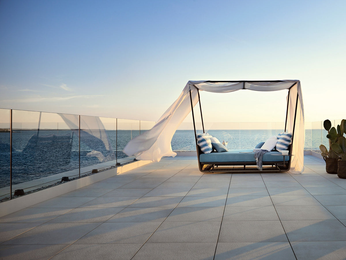 Roberti Portofino canopied daybed overlooking the sea