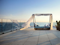 Roberti Portofino canopied daybed overlooking the sea