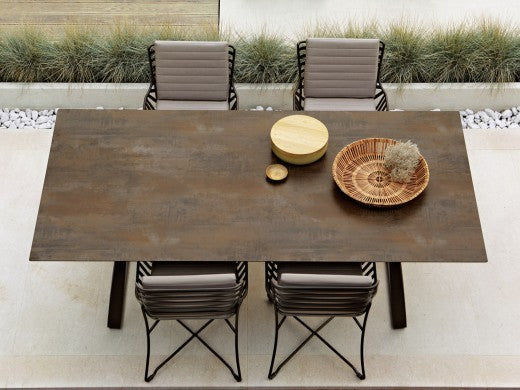 Roberti Portofino outdoor dining setting with Corten finish table