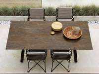 Roberti Portofino outdoor dining setting with Corten finish table