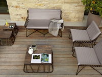 Roberti Portofino outdoor lounge setting with woven seating and coffee tables