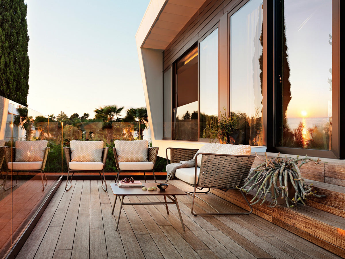 Roberti Portofino lounge seating and coffee table at sunset