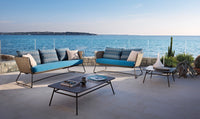 Roberti Portofino coffee tables with outdoor sofas overlooking the sea