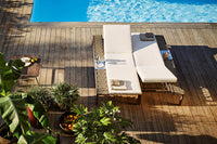 Roberti Portofino sunbeds beside a swimming pool