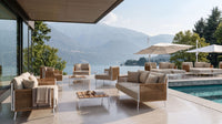 Roberti Venetian Sofa Two Seater beside a lakefront pool