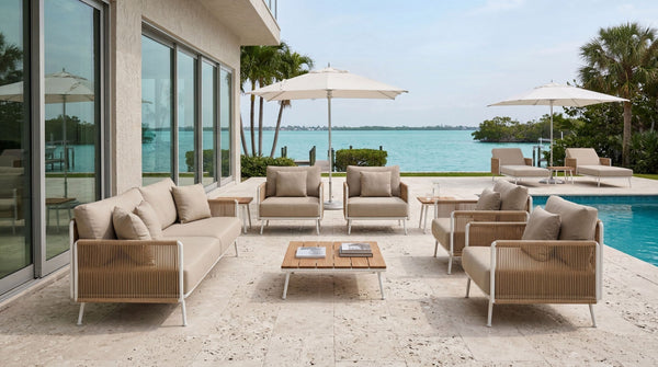 Roberti Venetian Lounge Chair in a waterfront pool setting