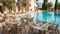 Roberti Venturio outdoor dining chairs in a poolside setting